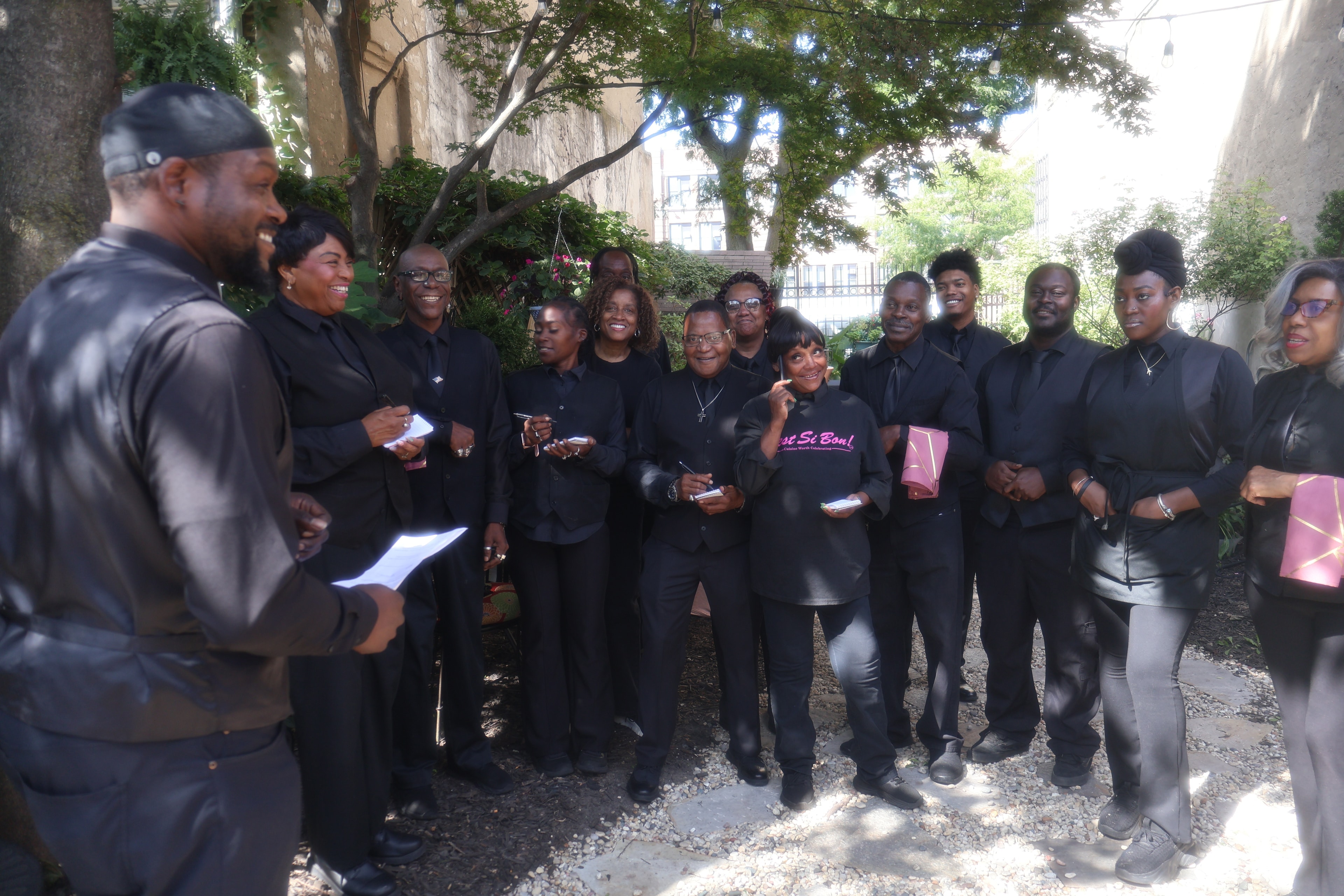 C'est Si Bon catering team briefing before an event