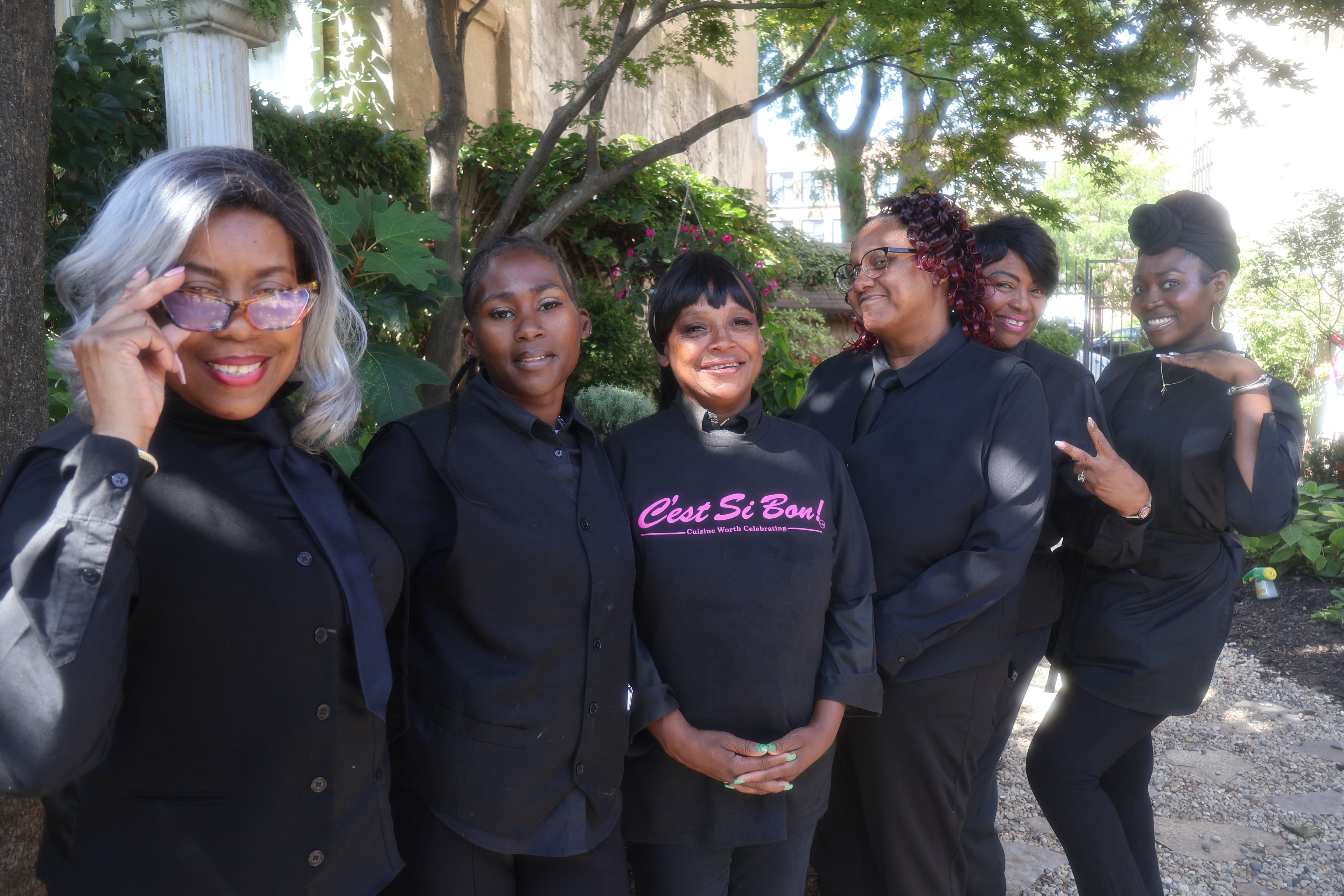 C'est Si Bon staff members in uniform
