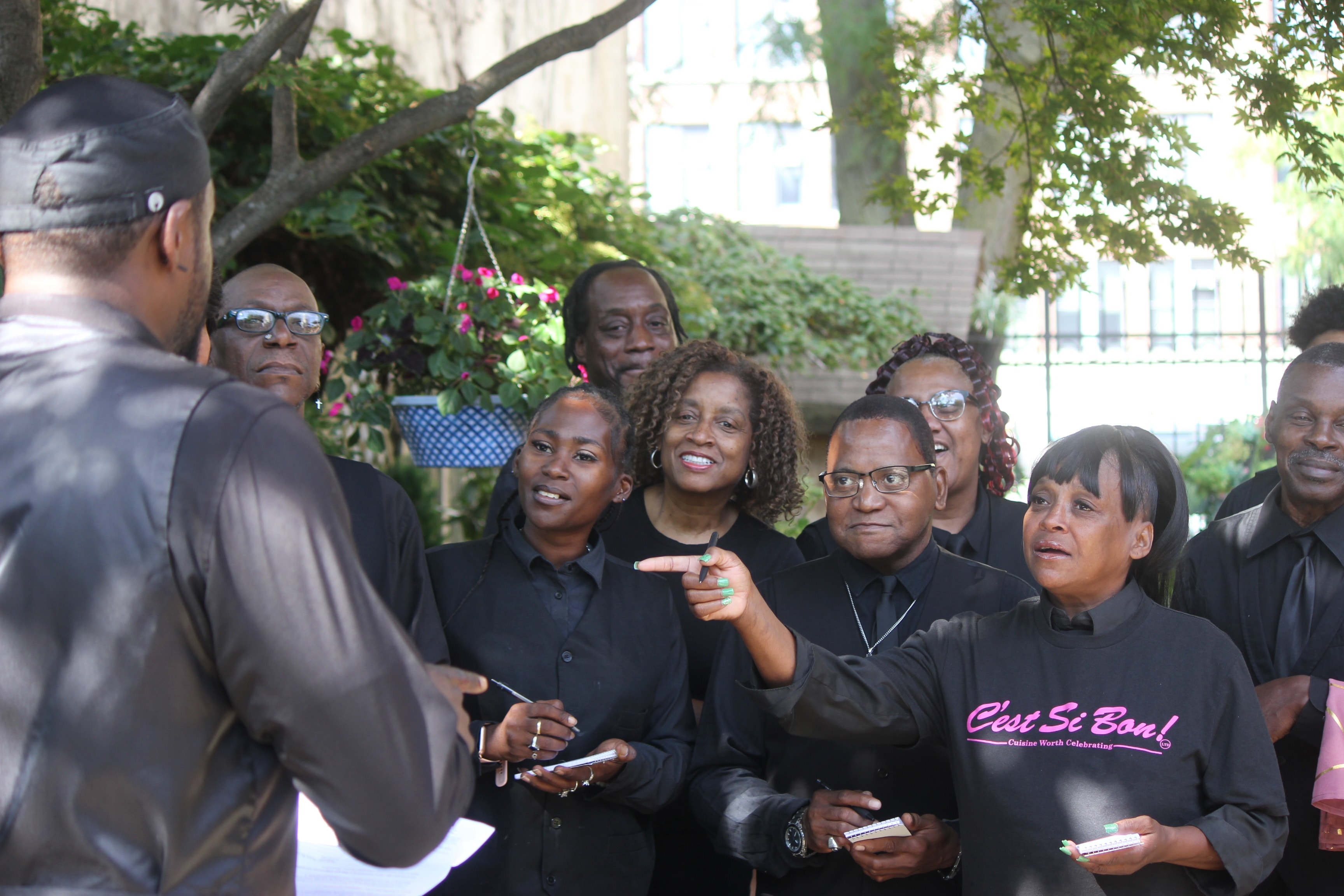C'est Si Bon team gathering outdoors
